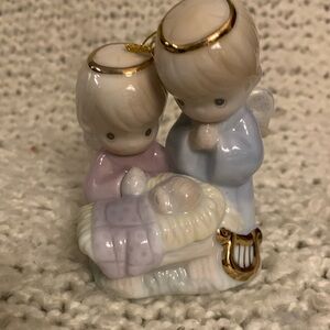 AVON
Precious Moments ornament by Enesco from 1997.